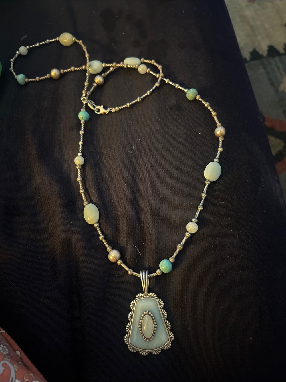Sincerely Southwest. Silver and aventurine stone long necklace.